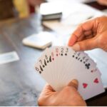Rummy and Mathematics: Unravelling the Mathematical Mysteries of the Game